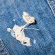 Effektiva sätt, hur och hur du snabbt kan ta bort tandkött från jeans hemma